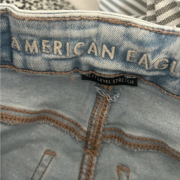 American Eagle Outfitters Size 000 Button Fly Light Wash Flare Jeans - Picture 2 of 8